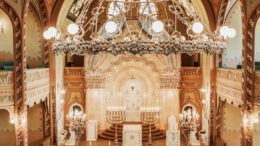 brown wooden bench inside cathedral