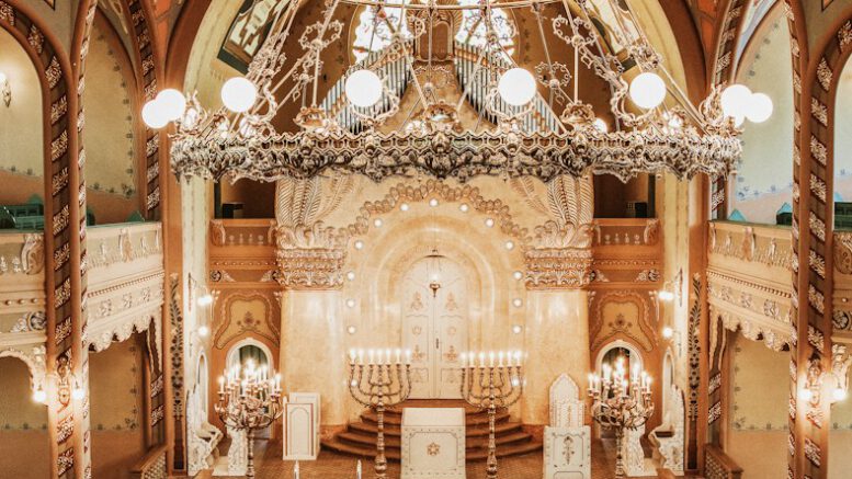 brown wooden bench inside cathedral