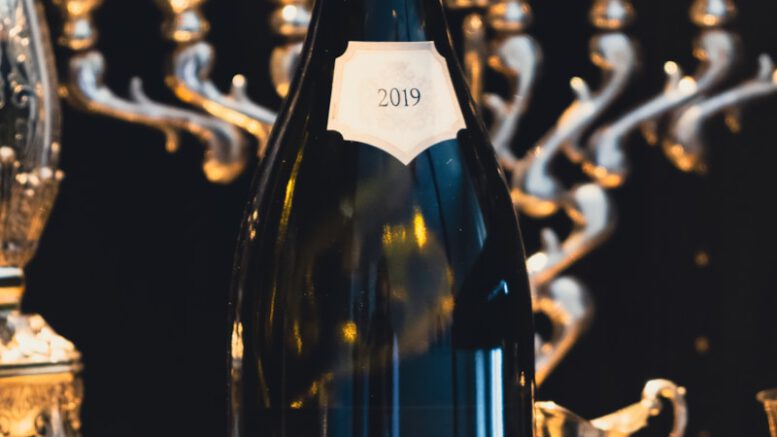 white labeled bottle on table