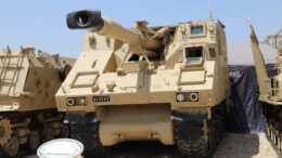 brown battle tank on dirt ground during daytime