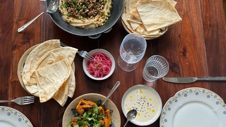 white ceramic plate on brown wooden table