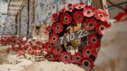 Memorial wreath of red anemones with date 7.10.23
